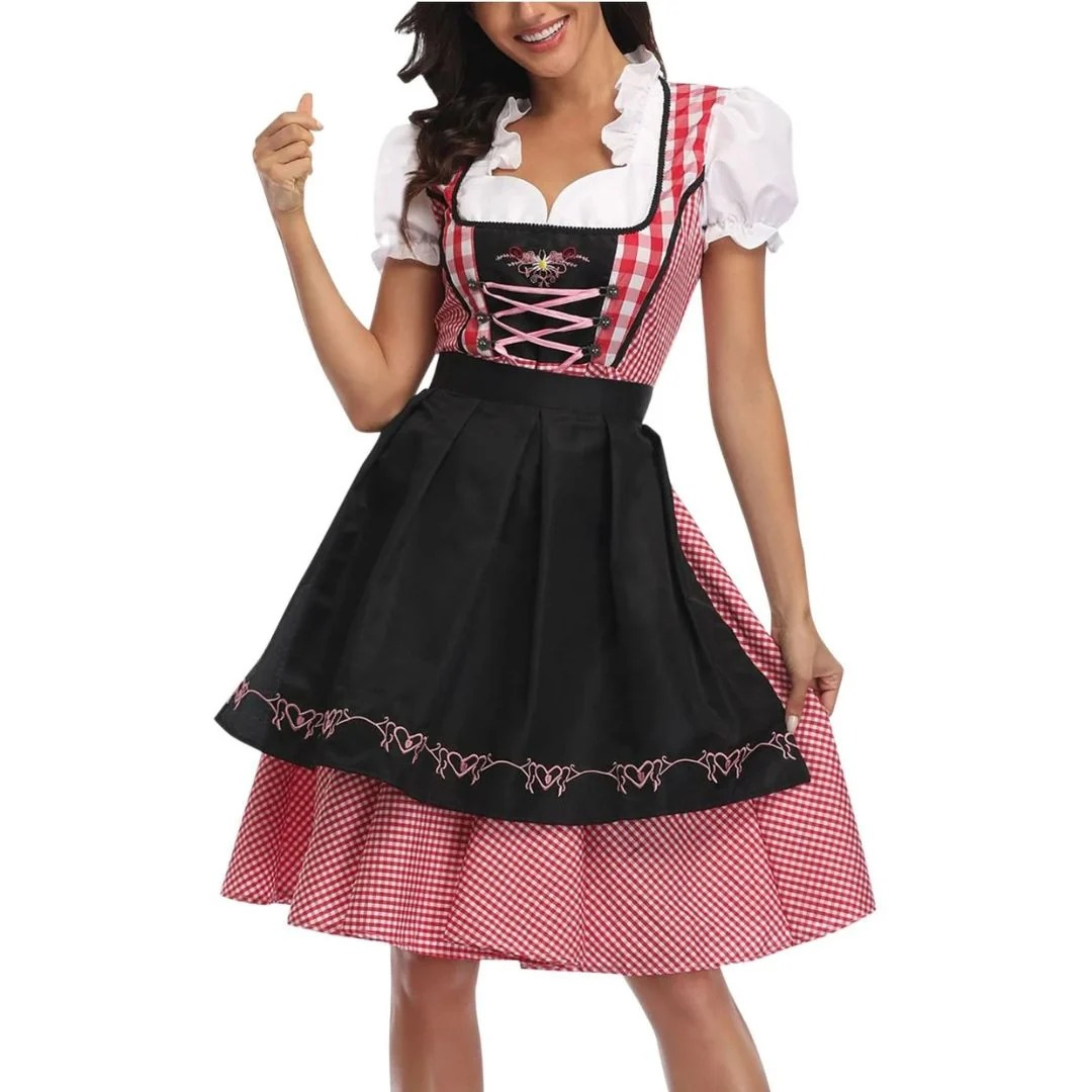 Red gingham dirndl with black apron, pink lace-up bodice and puffed white sleeves, front view.