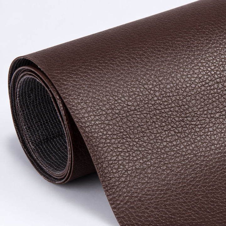 Self-Adhesive Leather Repair Patch dark chocolate brown grained patch roll with dark woven backing.