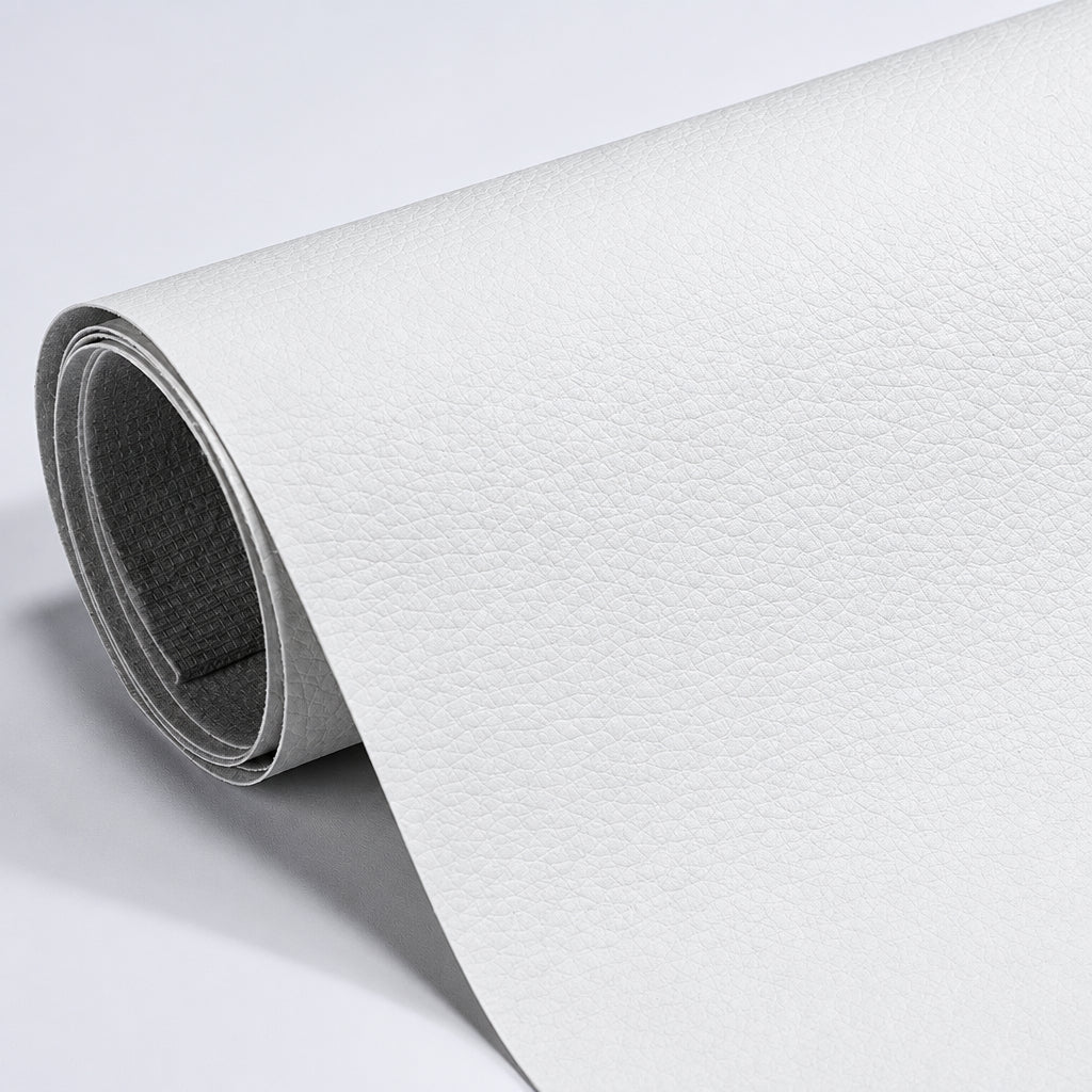 Self-Adhesive Leather Repair Patch white grained patch roll with dark gray backing.