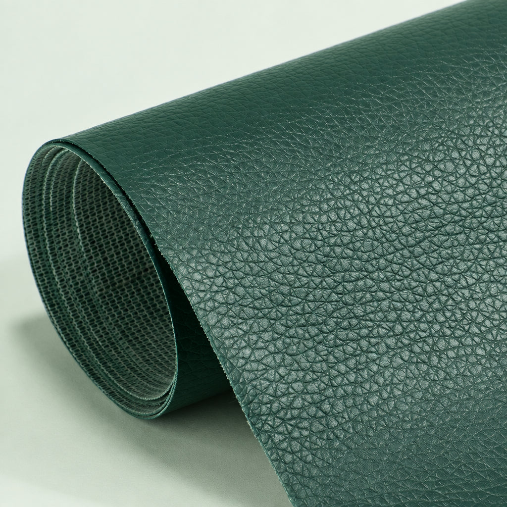 Self-Adhesive Leather Repair Patch deep green grained patch roll with mesh-textured backing.