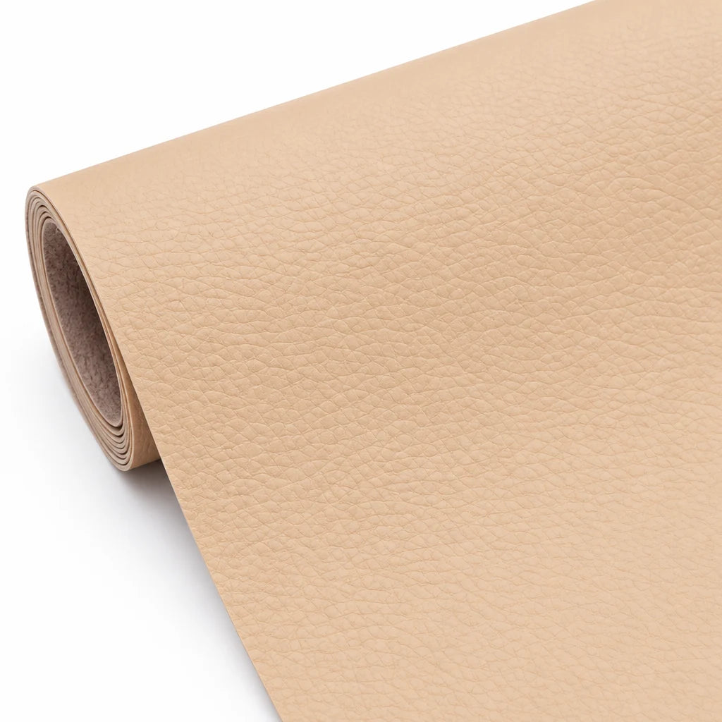 Self-Adhesive Leather Repair Patch light tan grained patch roll with pinkish-brown backing.