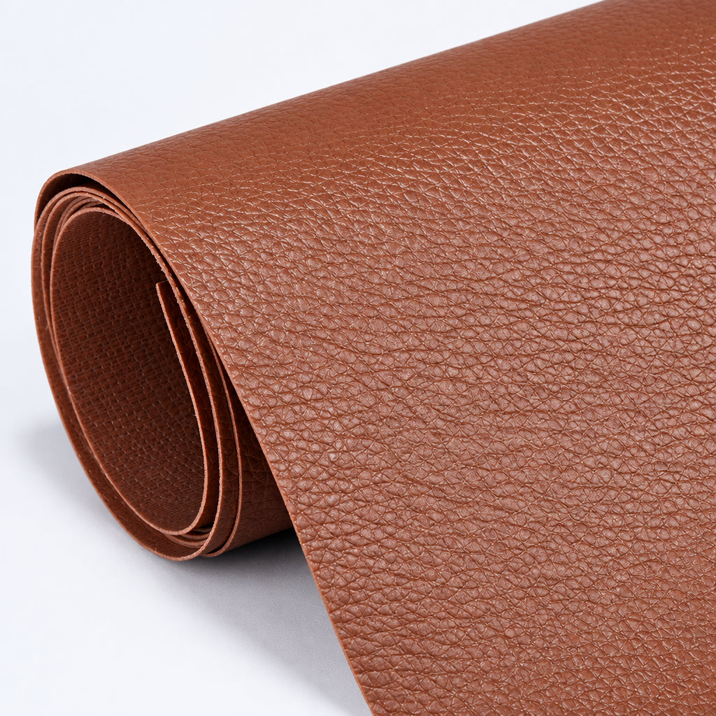 Self-Adhesive Leather Repair Patch reddish-brown grained patch roll with matching backing.