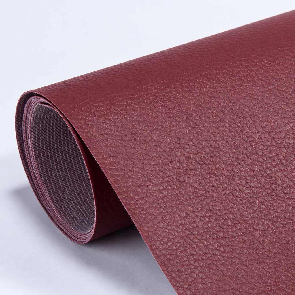 Self-Adhesive Leather Repair Patch burgundy grained patch roll with mesh-textured backing.