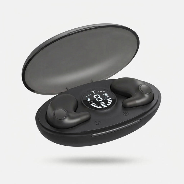 Black charging case with lid open and two earbuds docked, detail.