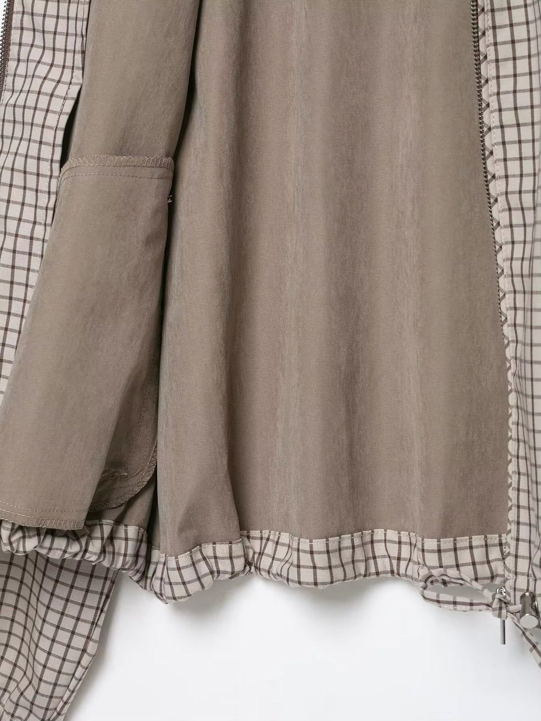 Women's Plaid Hooded Cropped Jacket detail showing the open lining, inner pocket and drawstring hem.