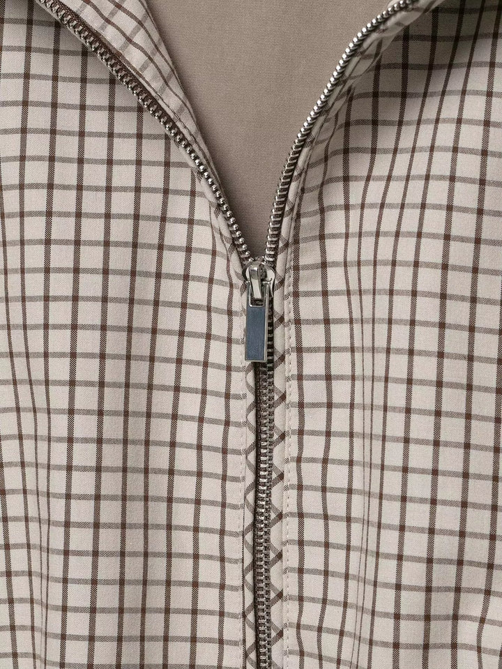 Women's Plaid Hooded Cropped Jacket detail showing the silver zipper against the brown-and-cream check fabric.