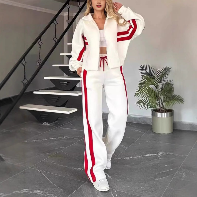 Beige lounge set with contrast stripes, zip-up jacket and wide-leg pants, front view.