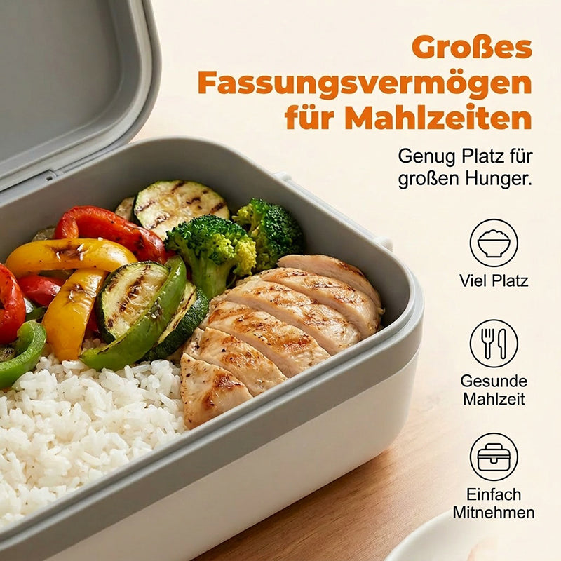 Open lunch box filled with sliced grilled chicken, white rice, broccoli, zucchini and bell peppers.