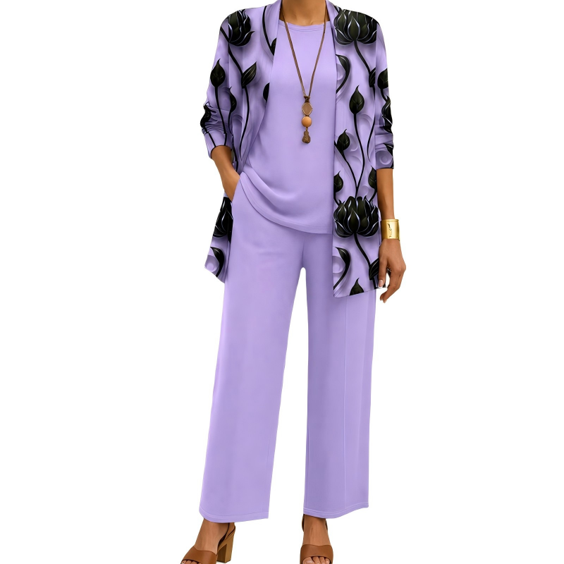 Lavender version of the set, the open cardigan printed with black lotus flowers over a matching top and pants. 4