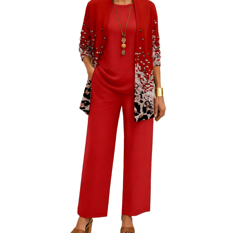 Red version, the long cardigan showing a speckled white and black pattern that fades upward, with matching top and pants.
