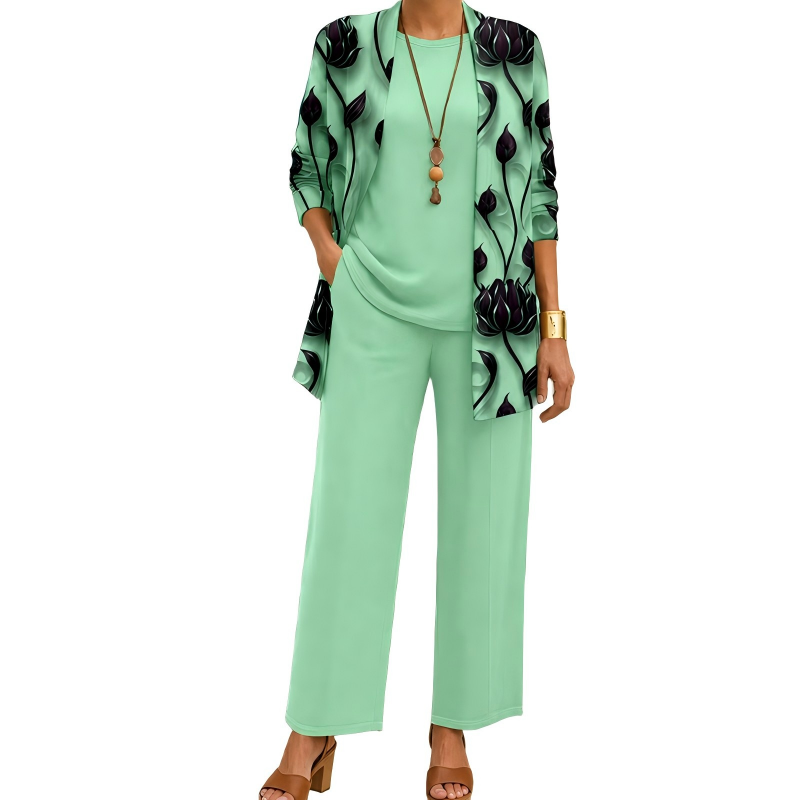 Mint green version of the set, with a dark lotus flower print on the open cardigan and matching top and pants. 6
