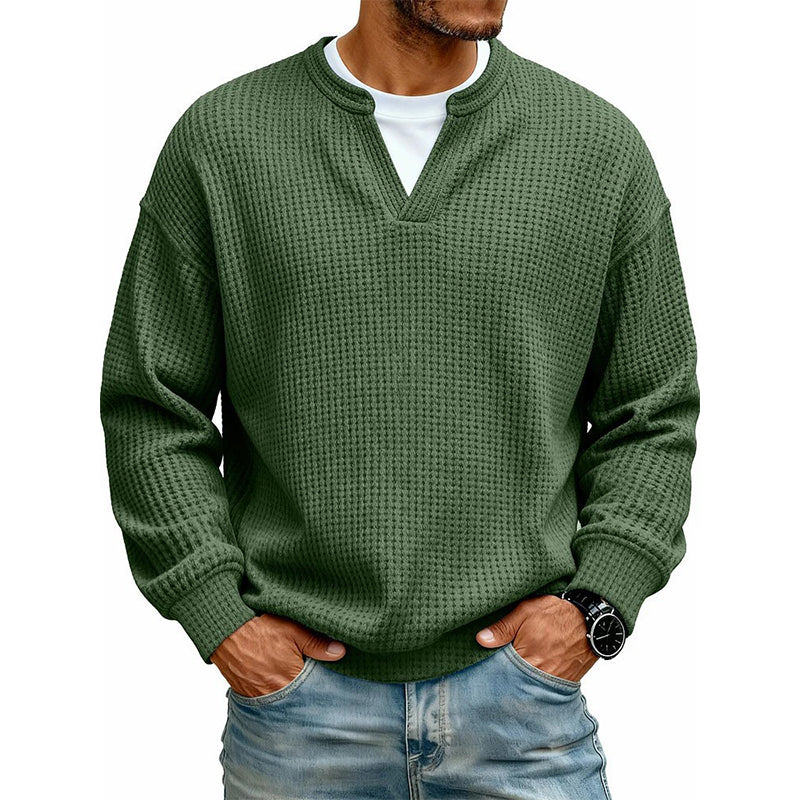 Front view of the top in olive green waffle knit with a layered white tee underneath 18