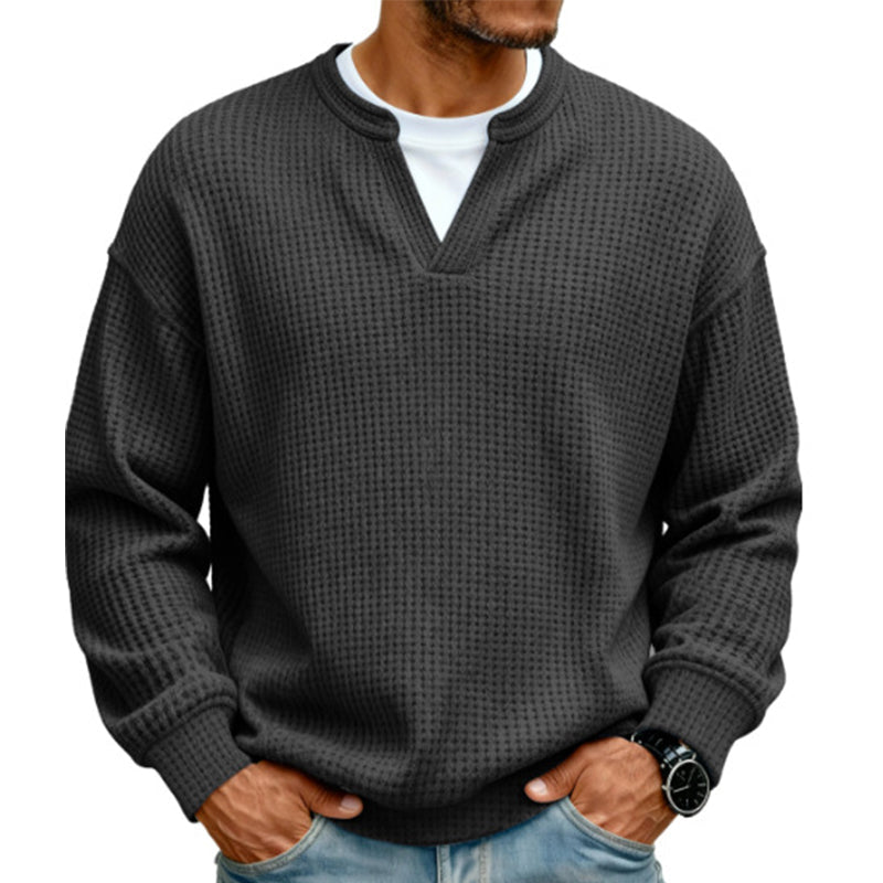 Front view of the top in dark charcoal gray waffle knit with ribbed cuffs and hem 15