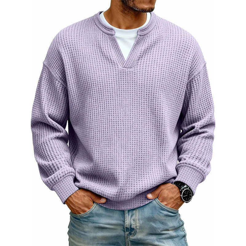 Front view of the top in soft lavender waffle knit, hands in jeans pockets 19