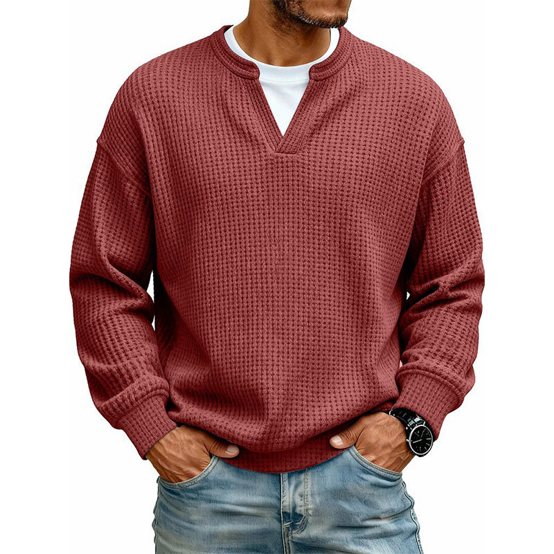 Front view of the top in brick red waffle knit, worn over a white tee 16