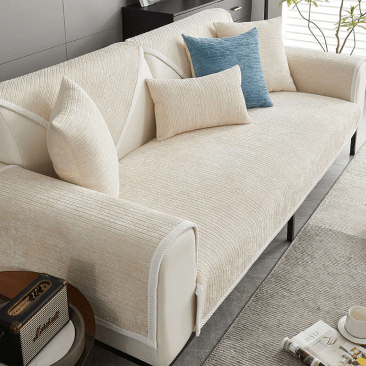 Grey anti-slip protective sofa cover another view with cream ribbed fabric and white trim