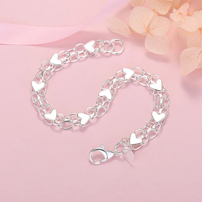 Sterling Silver Heart Bracelet | Classic Elegance-Nora Luxe