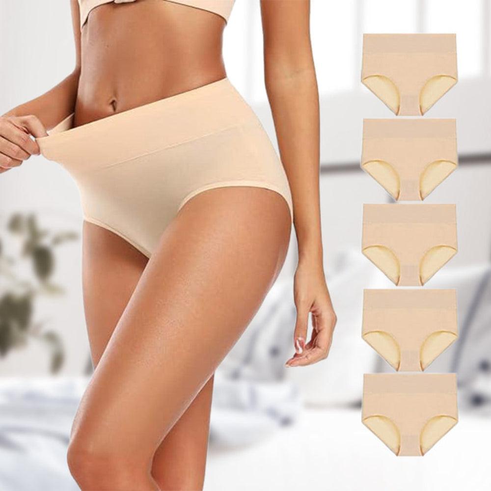 Model stretching the waistband of beige high-waisted briefs, with five matching beige pairs stacked in a column beside her. 1