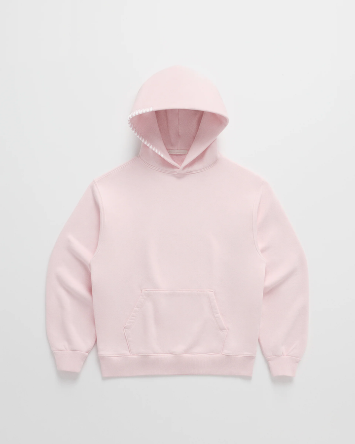 Light pink hoodie laid flat, front view, with white stitching along the hood edge and a front pouch pocket 3