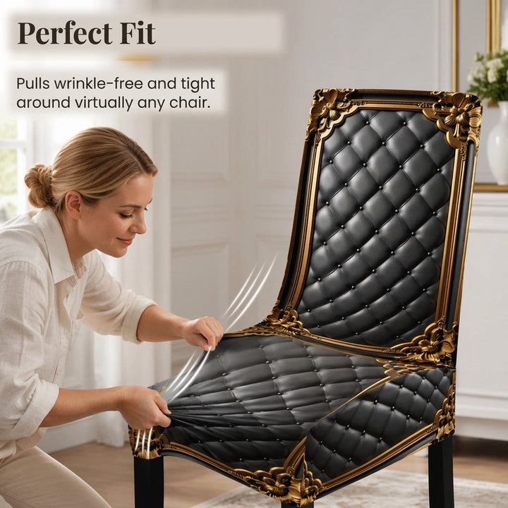 Another view of a black and gold chair cover being stretched over a chair.