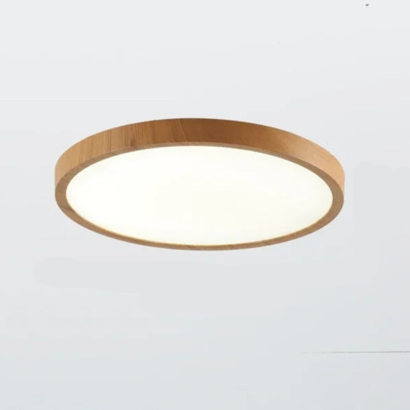 Light natural-wood round ceiling light with a white diffuser, shown alone against a plain pale background. 7