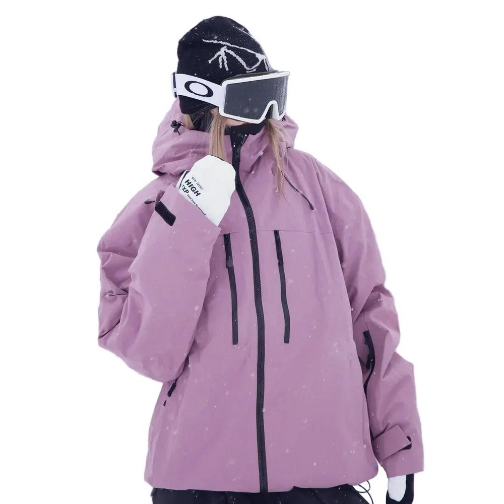 Model in a mauve jacket with hood down, one hand raised to the chin, three-quarter view 2