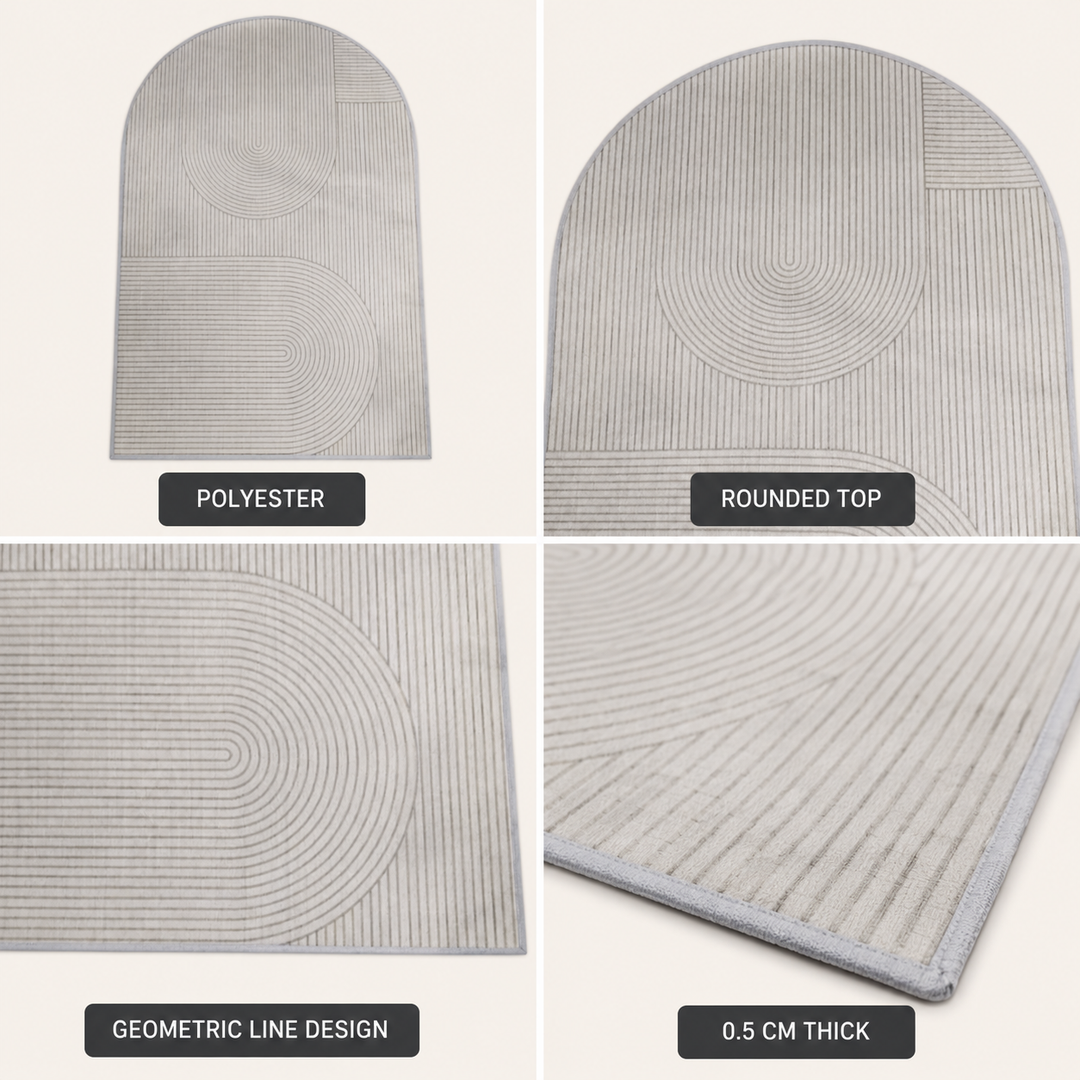 Another view of the beige and grey arch-shaped mat showing the full shape, pattern, and thin edge.