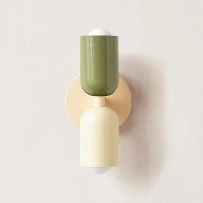 Retro wall lamp with an olive green top shade, cream lower shade and cream round backplate