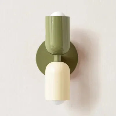 Retro wall lamp with an olive green top shade, cream lower shade and green round backplate
