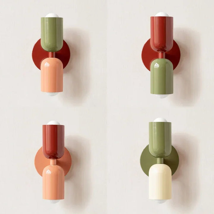 Four versions of the retro wall lamp in green, red, peach and cream combinations