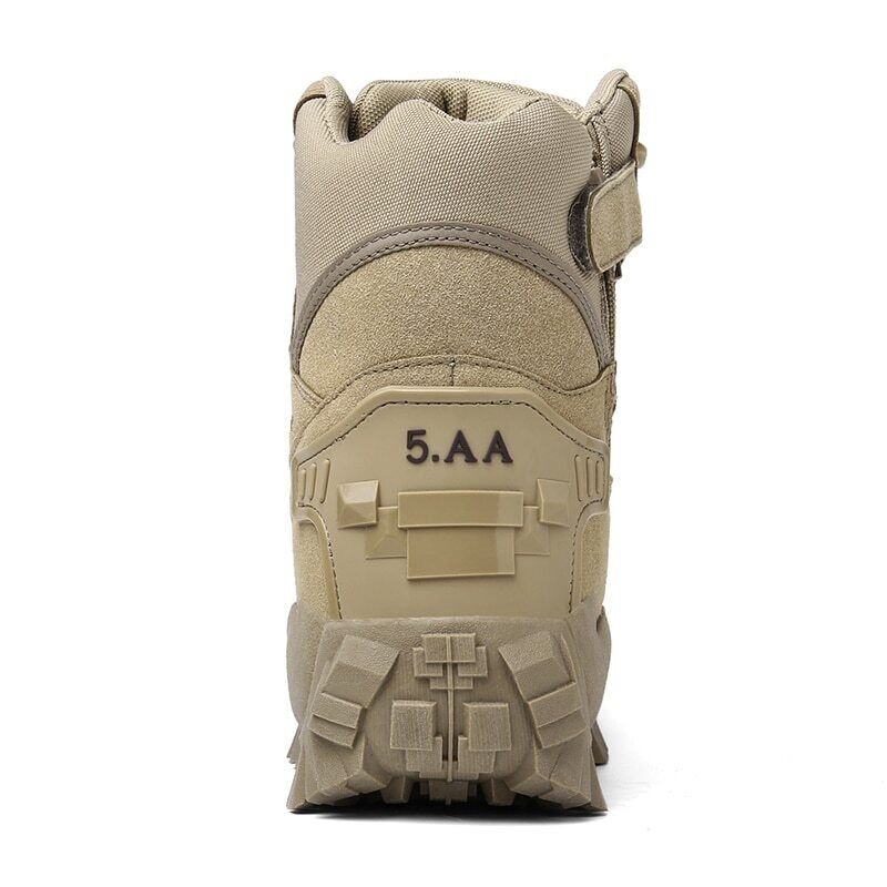Rear view of a tan boot showing the heel panel, pull strap and lugged sole 12