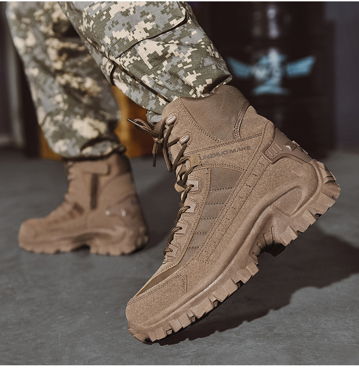 Brown suede boot with chunky sole, mid-step on a gray floor, worn with gray digital camouflage pants 5