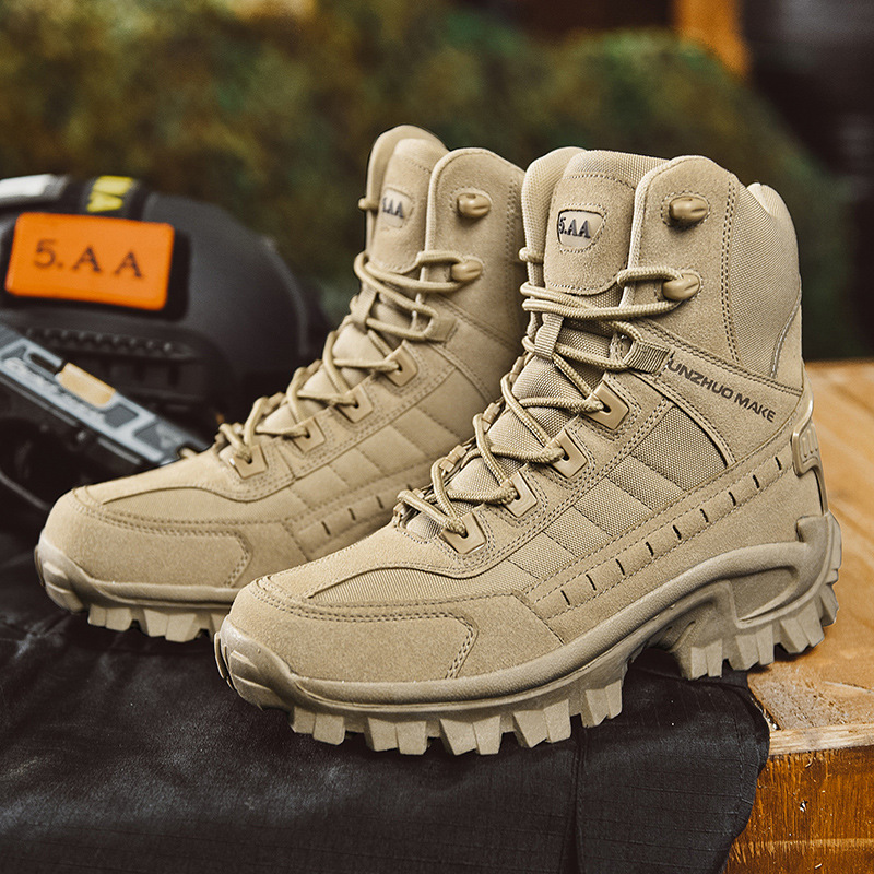 Pair of tan high-top lace-up boots with lug soles, shown on a wooden crate beside tactical gear 2