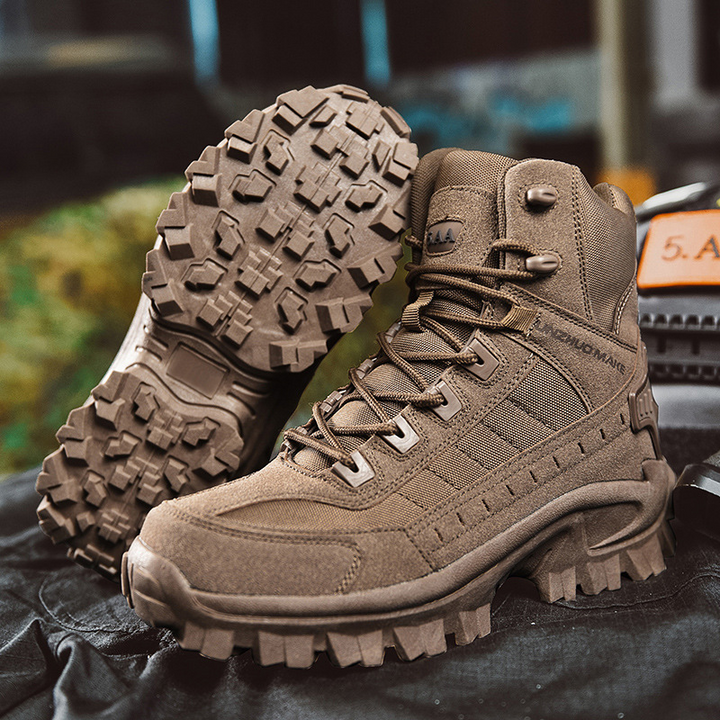 Brown boots on dark fabric, one tilted to display the deep lugged outsole 7