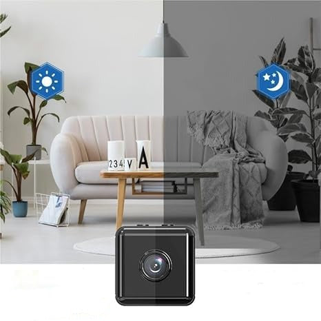 Black cube camera below a living room image split between daytime and darker night vision halves 7