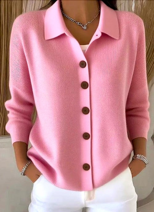Women's cardigan in pink, another view with a relaxed collar and button front.