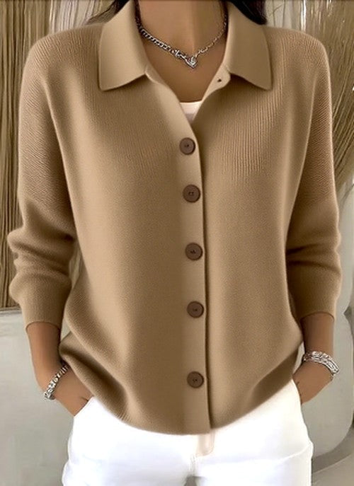 Women's cardigan in tan camel with five brown buttons, another view.