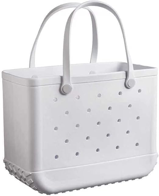 White tote with perforated sides, two tall handles, and a wavy textured base on a plain background.
