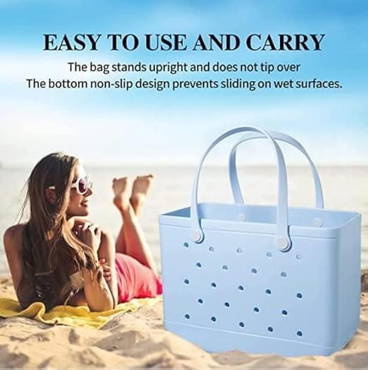 Light blue perforated tote standing upright on the sand.