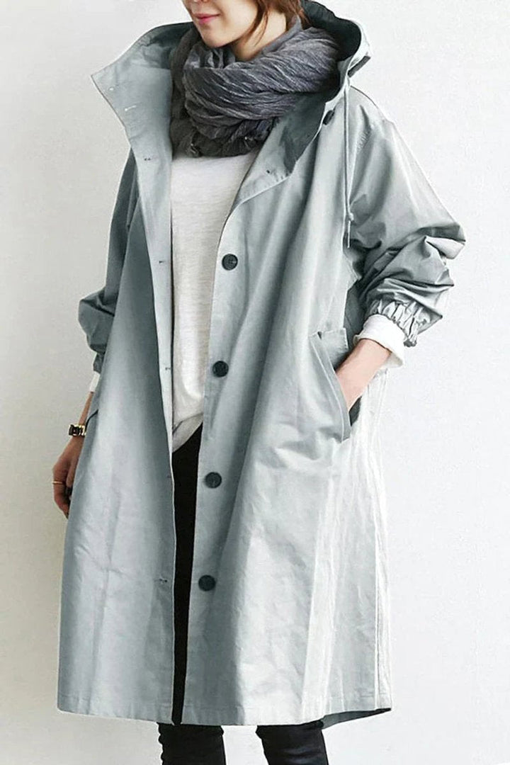 Women's pink hooded longline trench coat with oversized fit