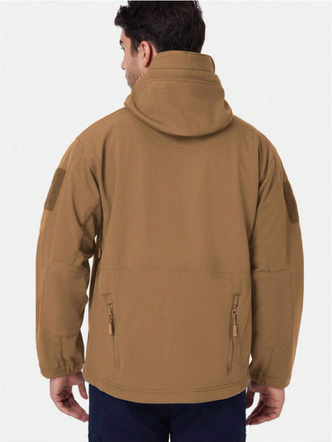 Back view of the tan jacket on a man, showing the hood, elbow patches, stitched back panel and lower zip pockets. 14