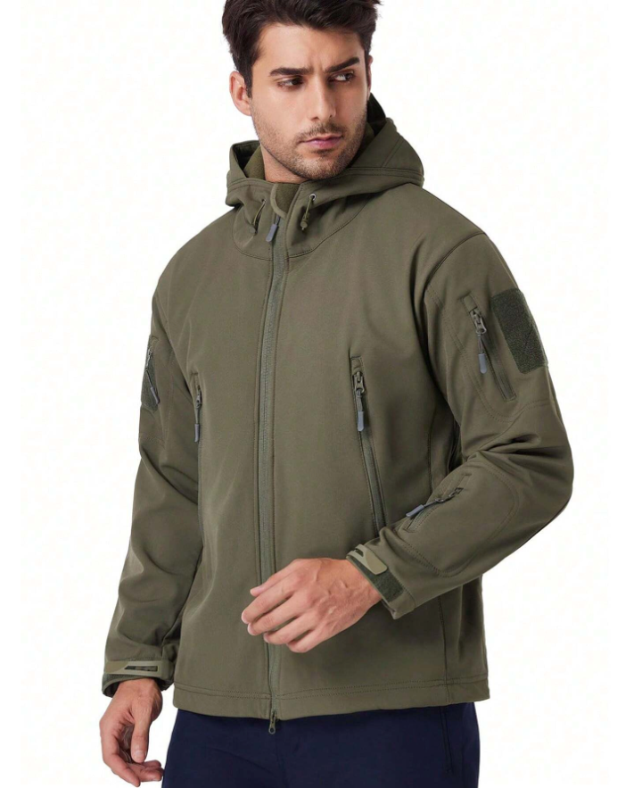 Man in the olive green hooded jacket, front three-quarter view, with chest zip pockets, sleeve patch and wrist tabs. 4
